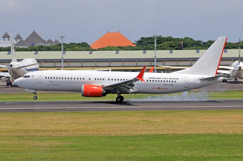 Free Airplane on Runway in Airport Stock Photo