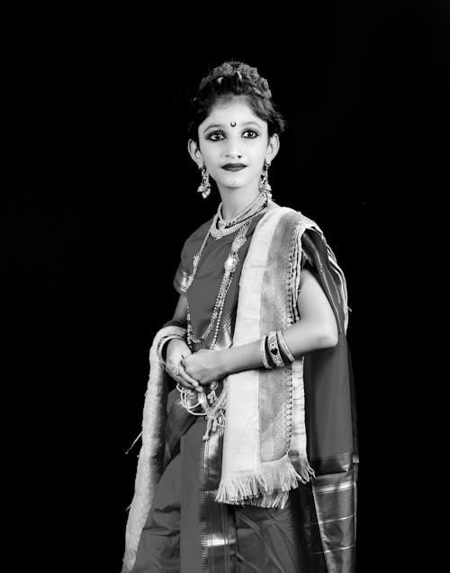 Young Woman Wearing a Sari and Ornate Jewelry