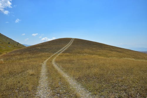 Fotos de stock gratuitas de campo, carretera, cielo azul