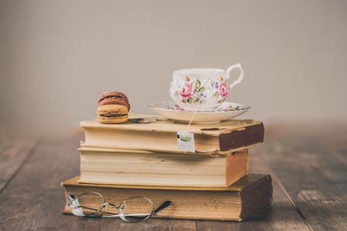Free Photo of Teacup On Top Of Books Stock Photo