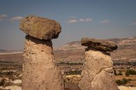 Explore the iconic fairy chimneys of Cappadocia in Ürgüp, Türkiye, showcasing unique geological formations.