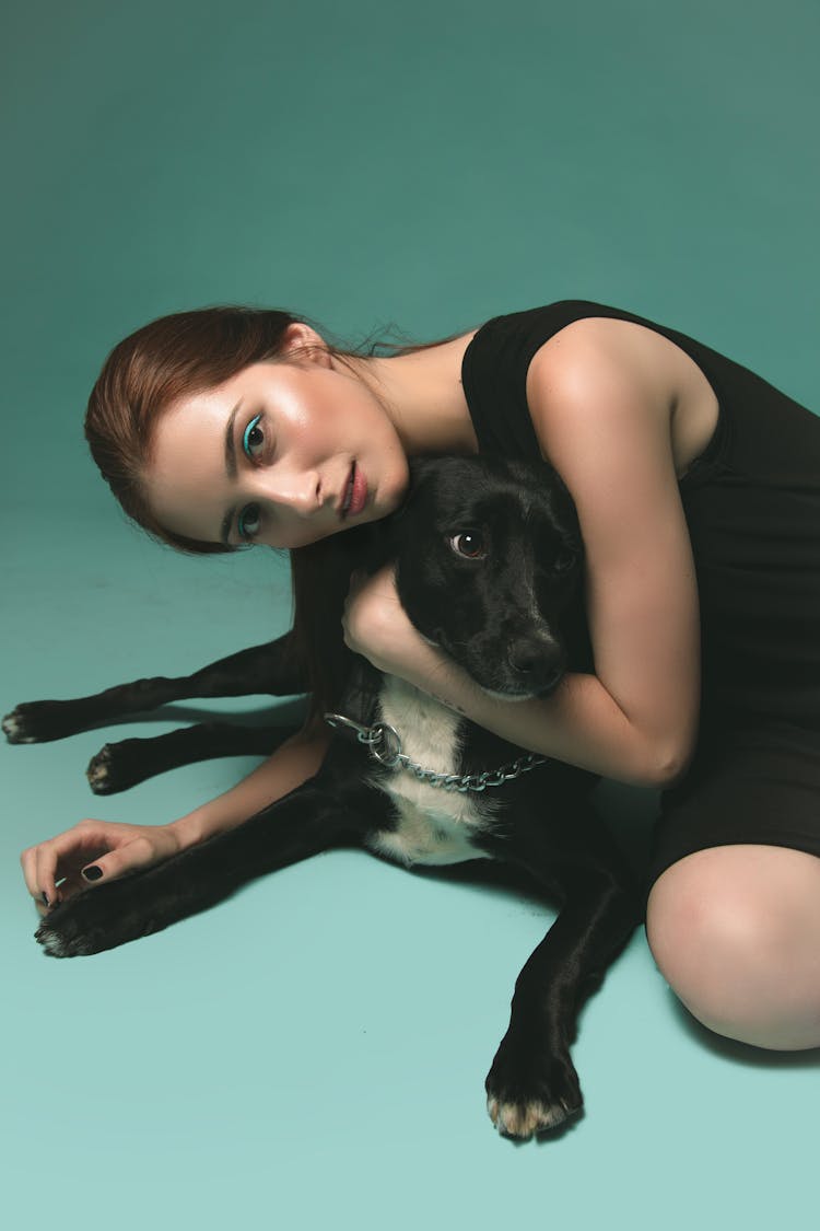 Photo Of Woman Hugging A Dog