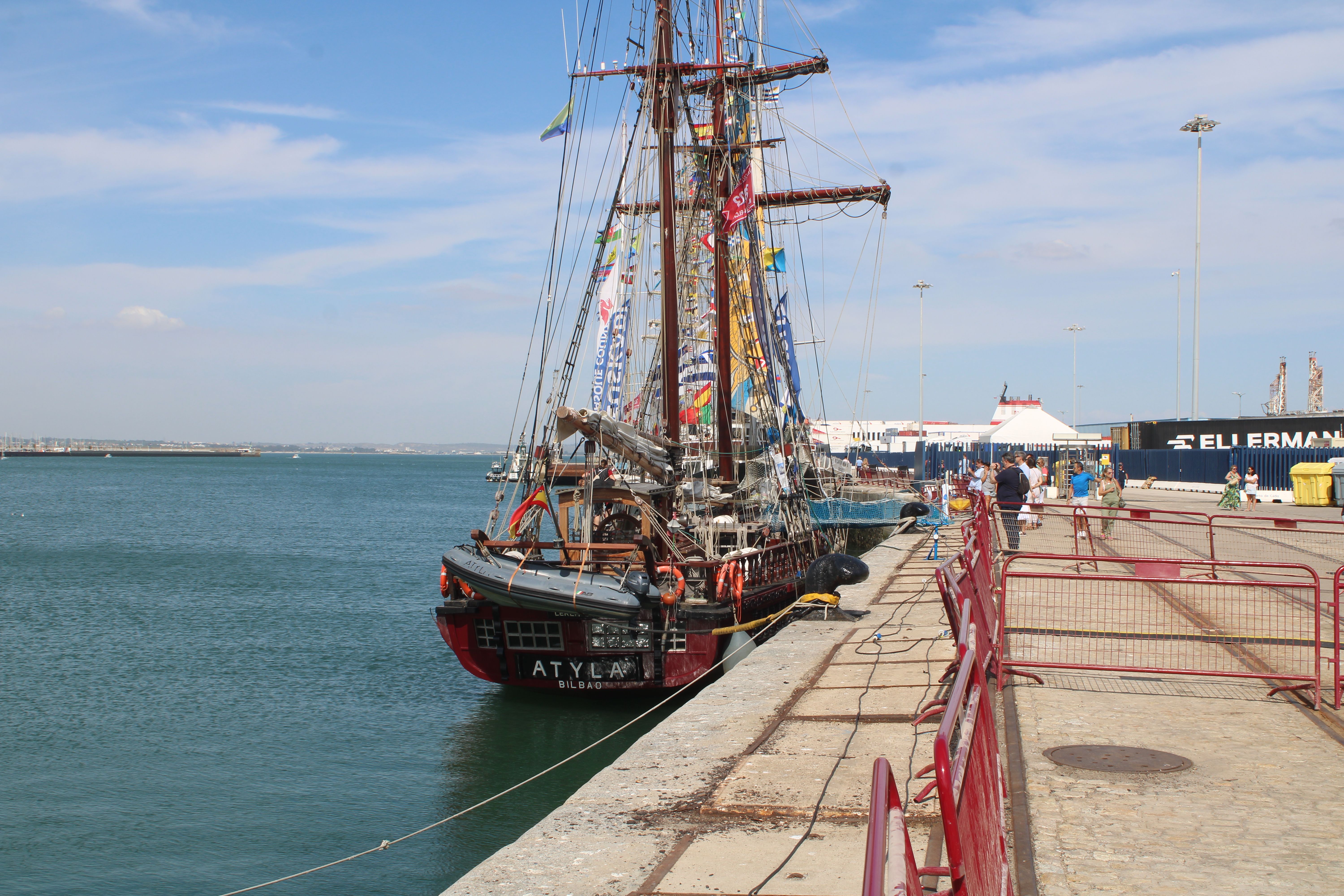A majestic sailing ship docked at Cádiz harbor, showcasing nautical heritage. - Cádiz