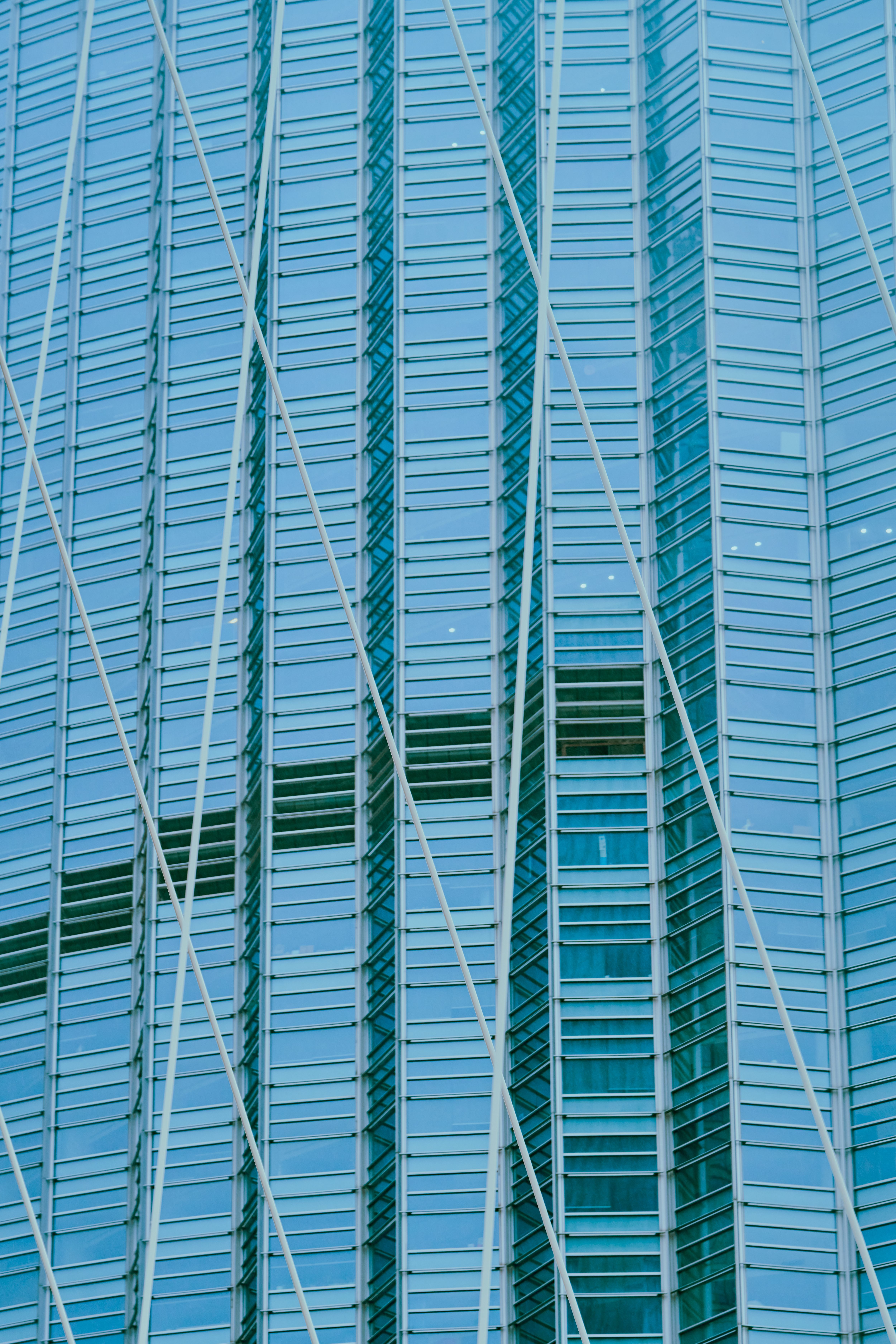 Corrugated Glass Facade of a Modern Skyscraper · Free Stock Photo