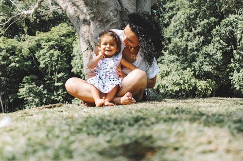 Free Woman Looking At Toddler Stock Photo