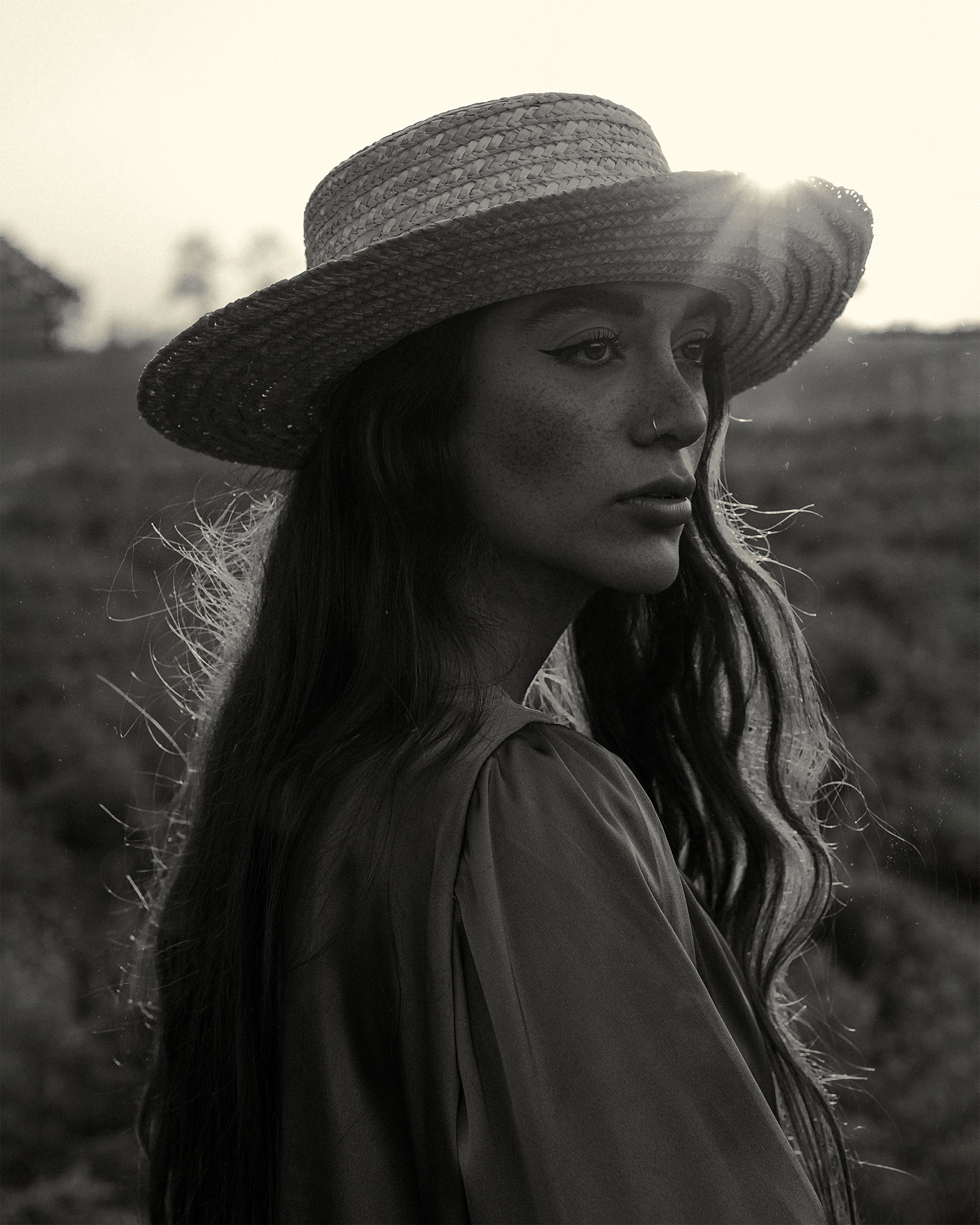 Woman in Hat at Sunset in Black and White · Free Stock Photo