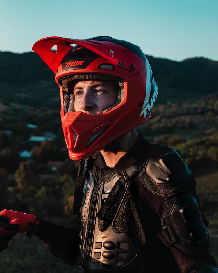 Portrait Of Man Wearing A Red Helmet