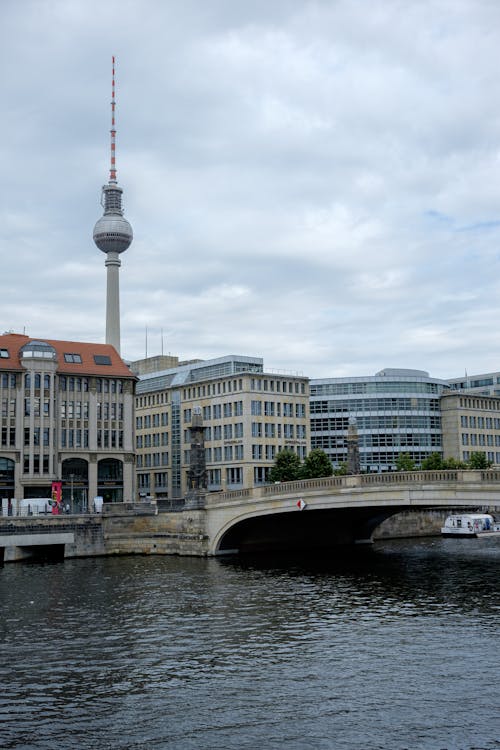 Bridge over the River with a View of the Fernsehturm Tower in Berlin, Germany