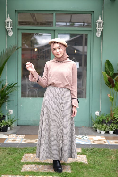 Free Woman Posing In Front Of Door Stock Photo