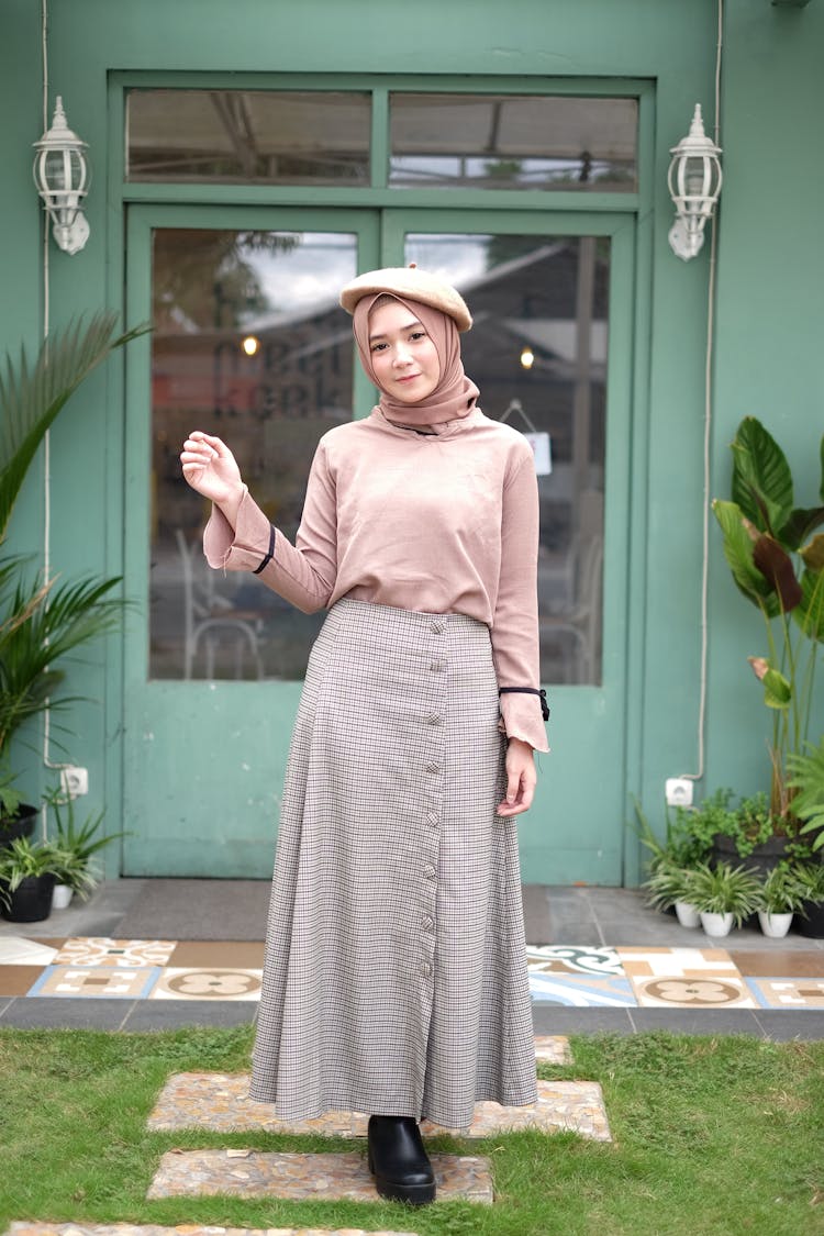 Woman Posing In Front Of Door