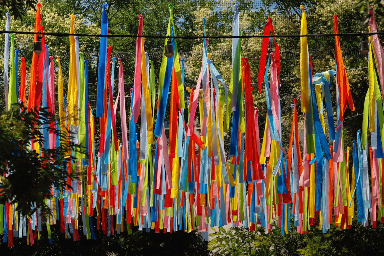 vivid colorful ribbons hanging outside creating lively decoration agai