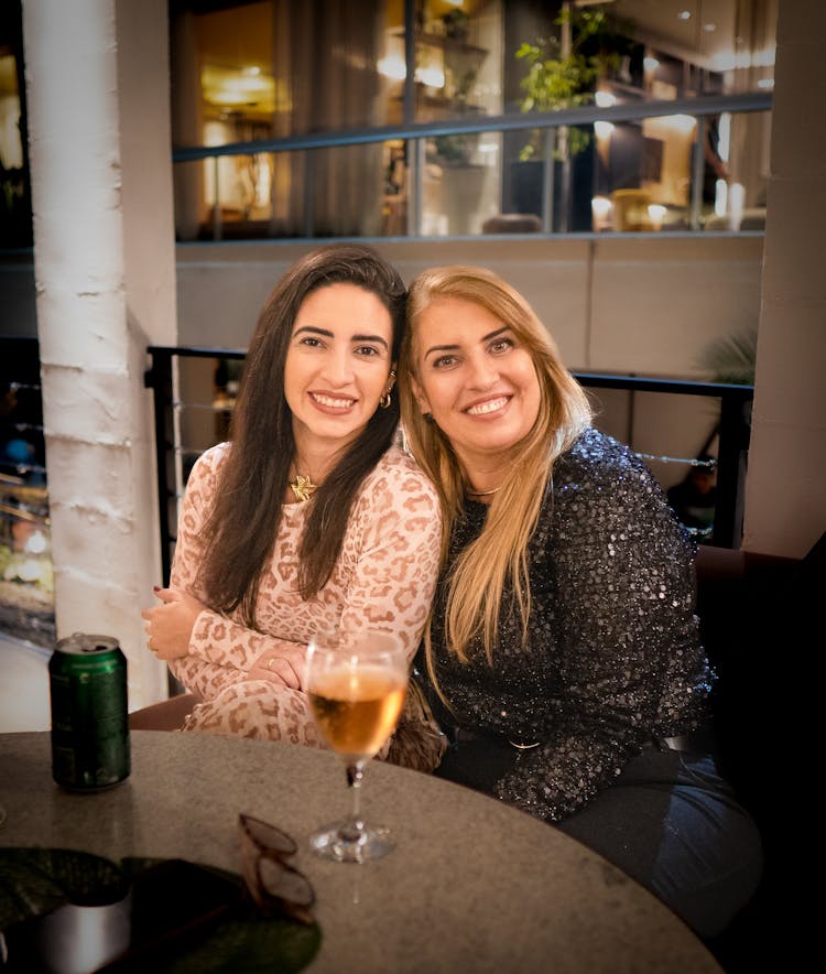 Friends Drinking Wine In A Restaurant