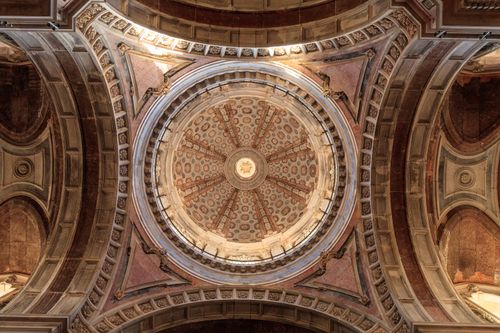 Free Detailed view of the intricate baroque architecture of the dome in Mafra Palace, Portugal. Stock Photo