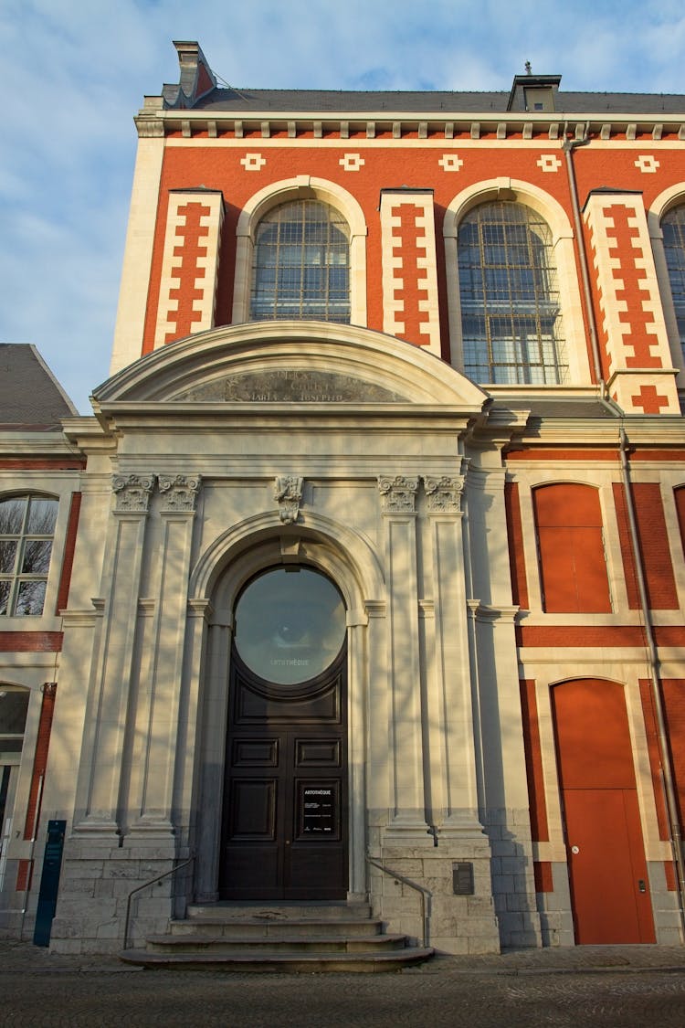 Red Wall Of Building In Mons In Belgium