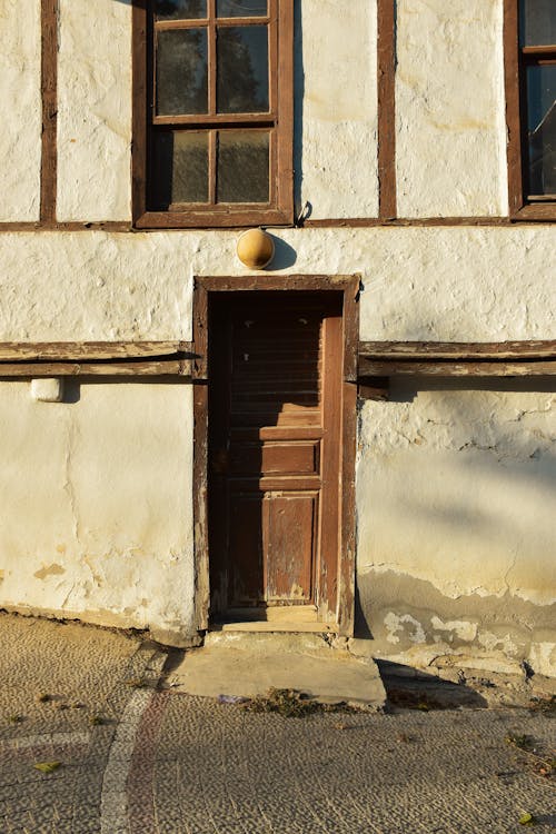 Door in Damaged Building Wall