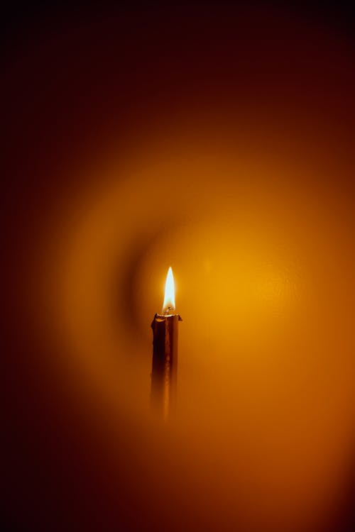 Close-up of Candlelight on Blur Background