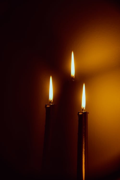 Three Burning Candlesticks