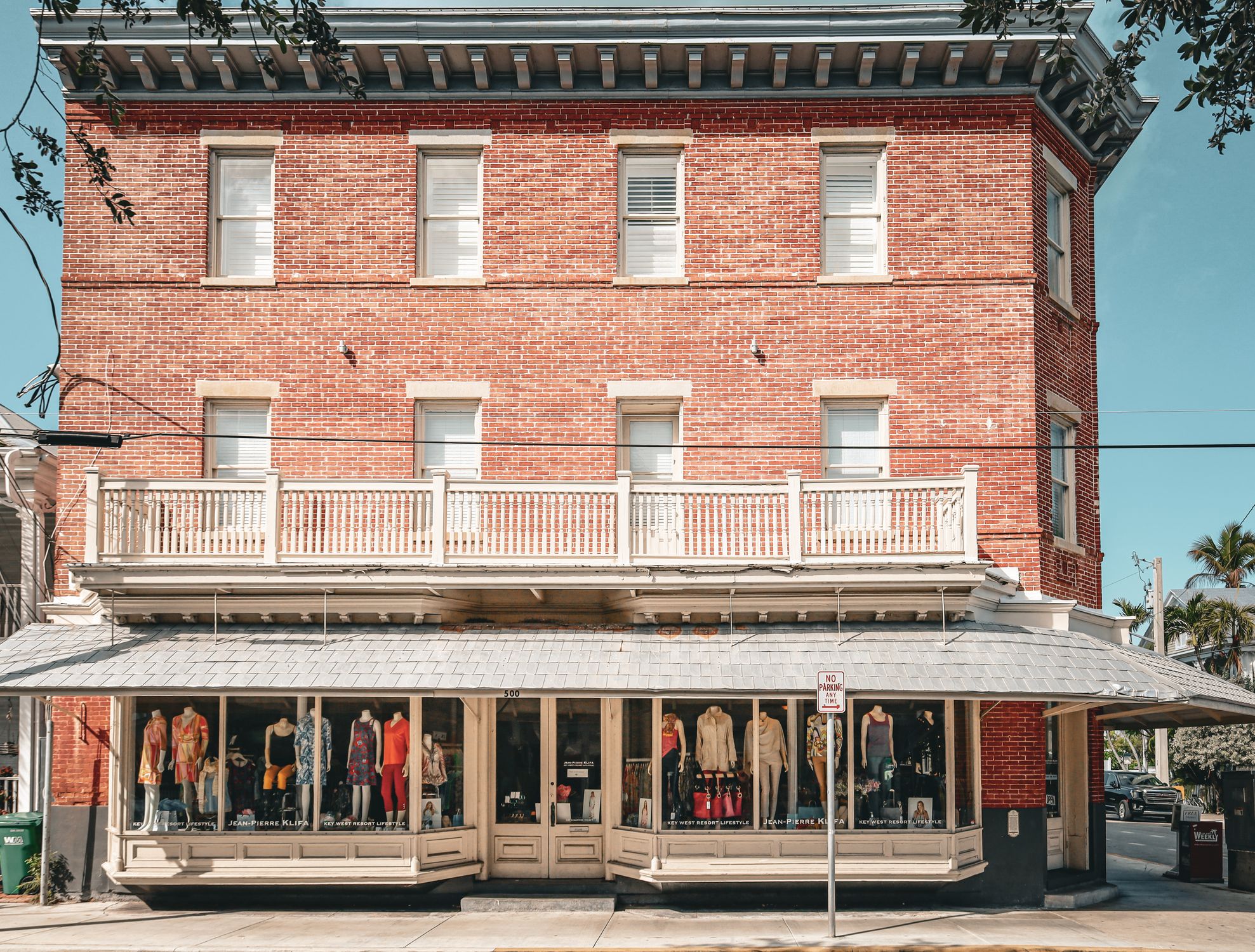 Cloth Store Building Clothing Store in Red Brick Building · Free Stock Photo