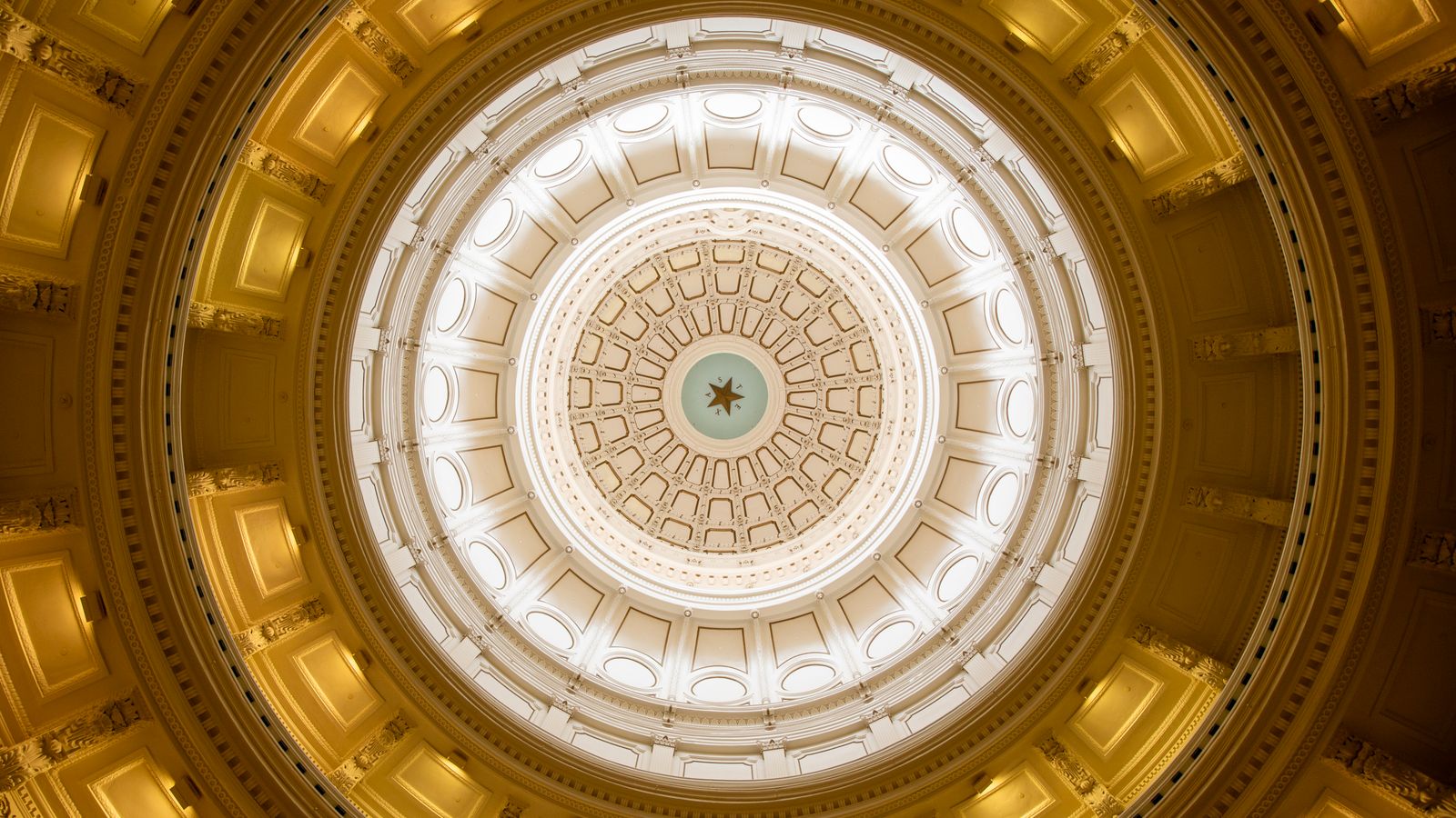 Stunning view of the Texas Capitol dome showcasing intricate architectural design and illumination.
