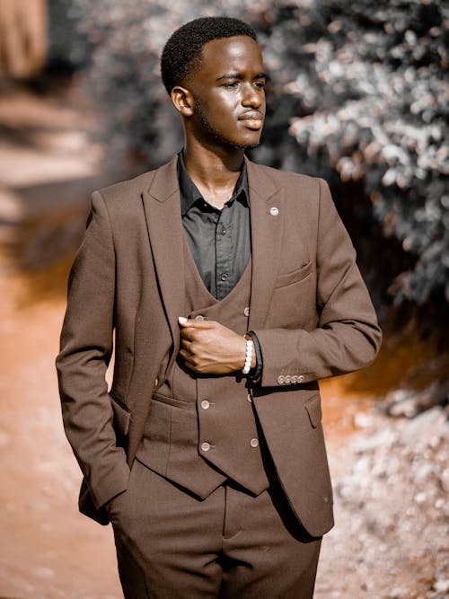 African Man Wearing Brown Suit 