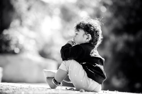 Little Boy in a Park in Black and White