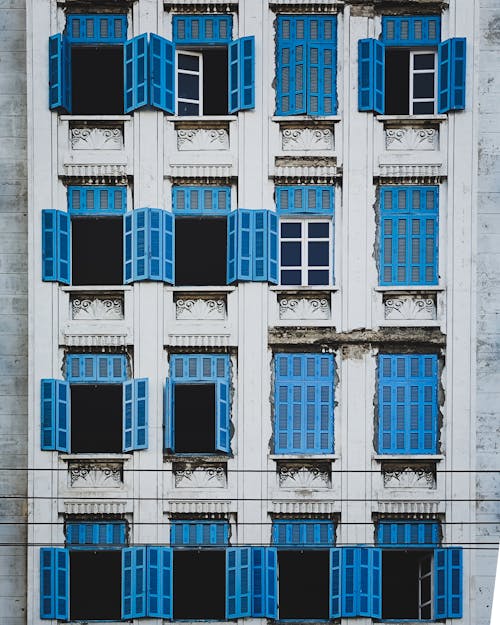Building with Blue Window Shutters 