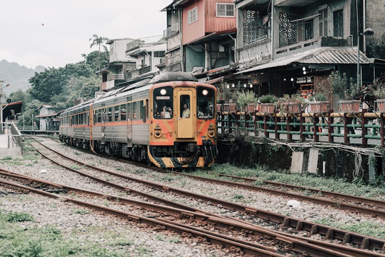 Train Passing Houses