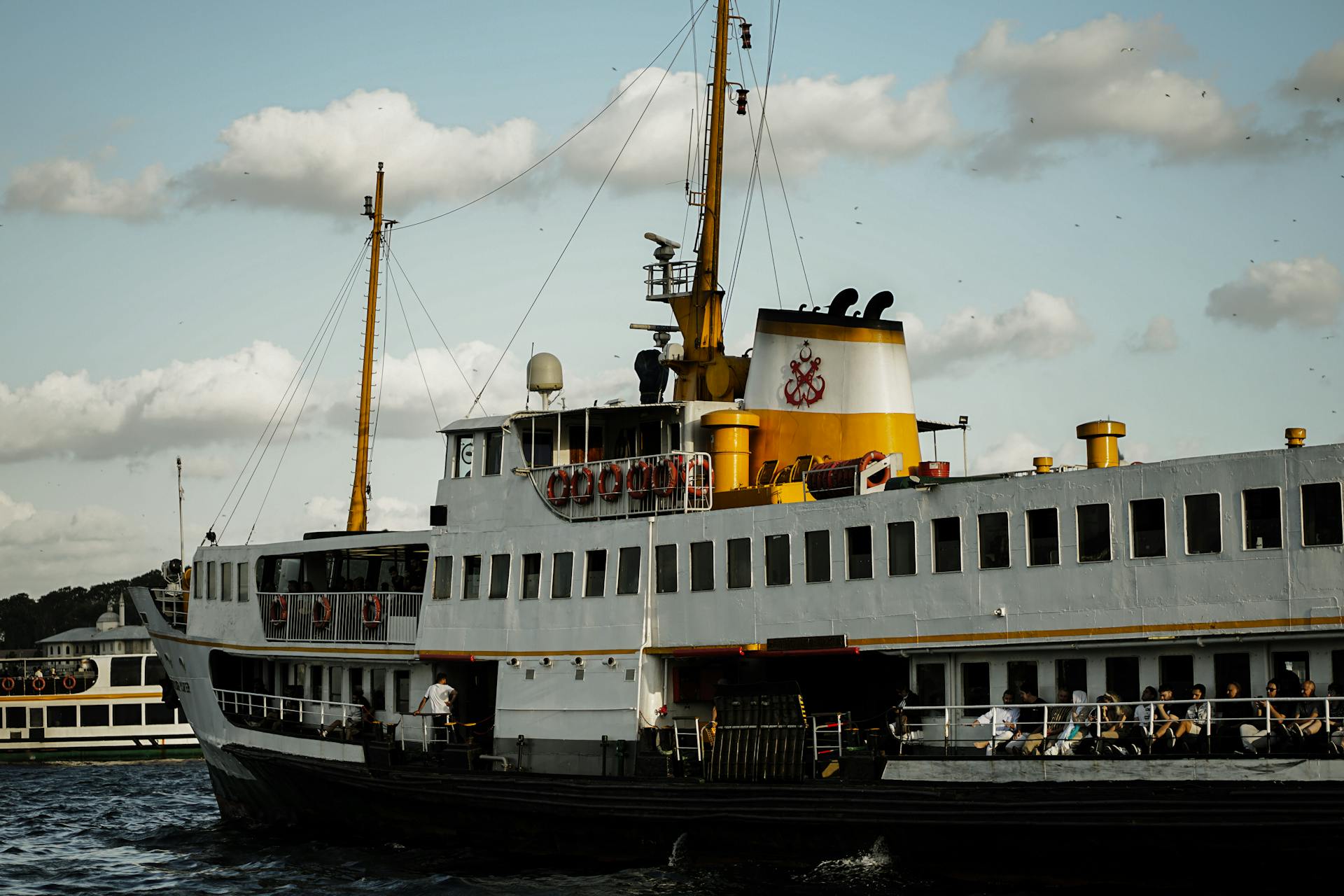A classic Istanbul ferry sailing along the Bosphorus, showcasing Turkish maritime charm.