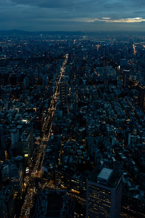Aerial View of a Modern City at Night