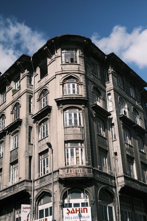 Free Explore the intricate design of a classic Ottoman style corner building in Istanbul, Turkey. Stock Photo