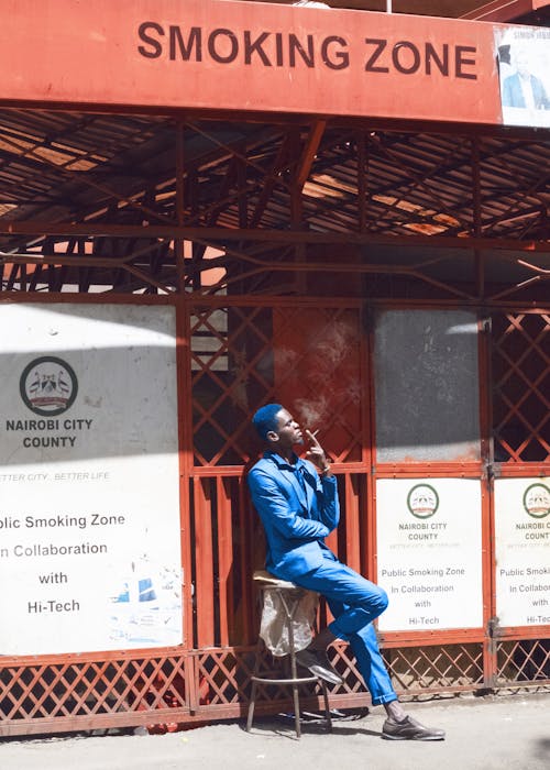 Man with Cigarette in Smoking Zone