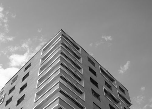 Free Black and white photo of a modern apartment building in Neuhausen am Rheinfall, Switzerland. Stock Photo