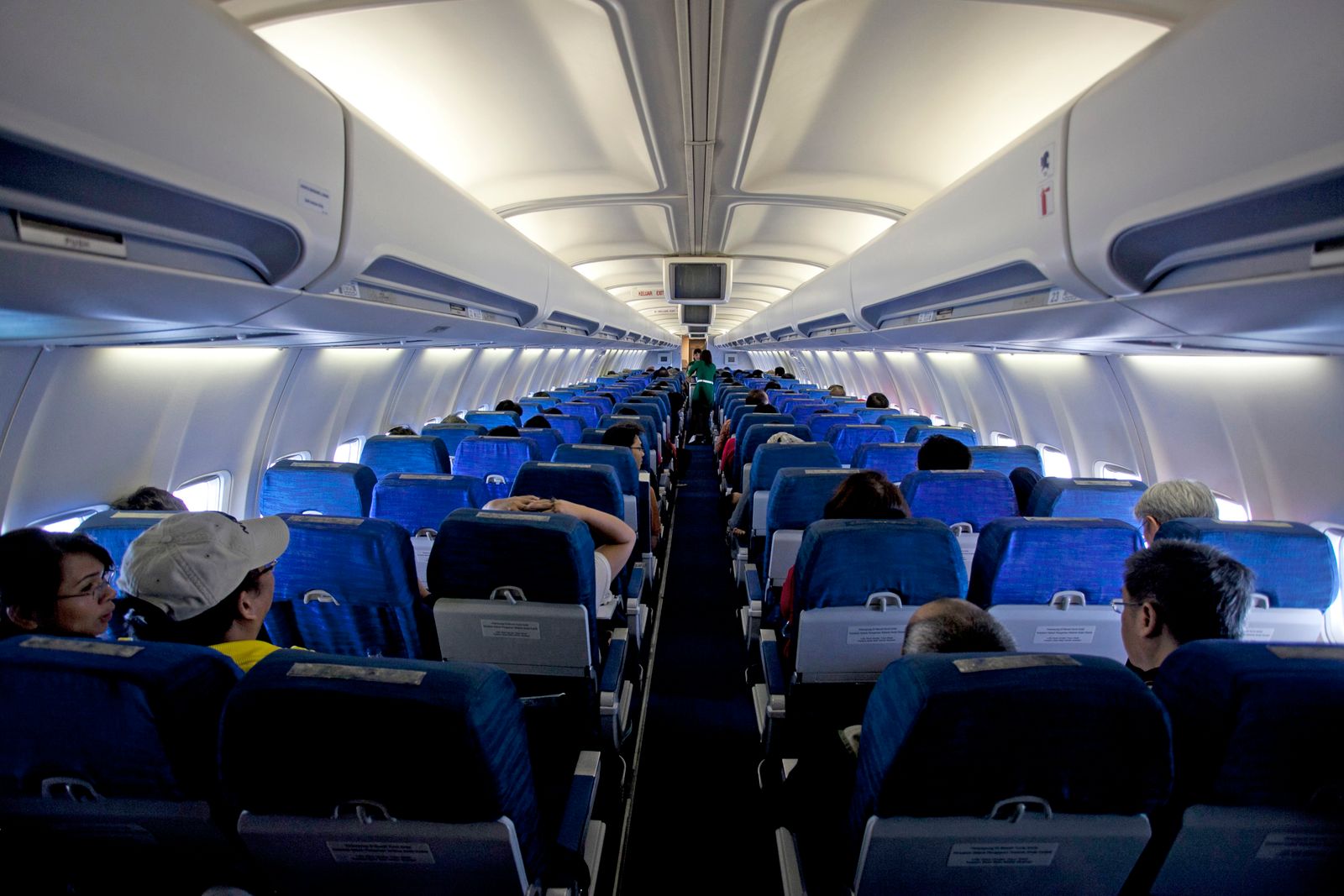 Aircraft flying above clouds on a long-haul international route