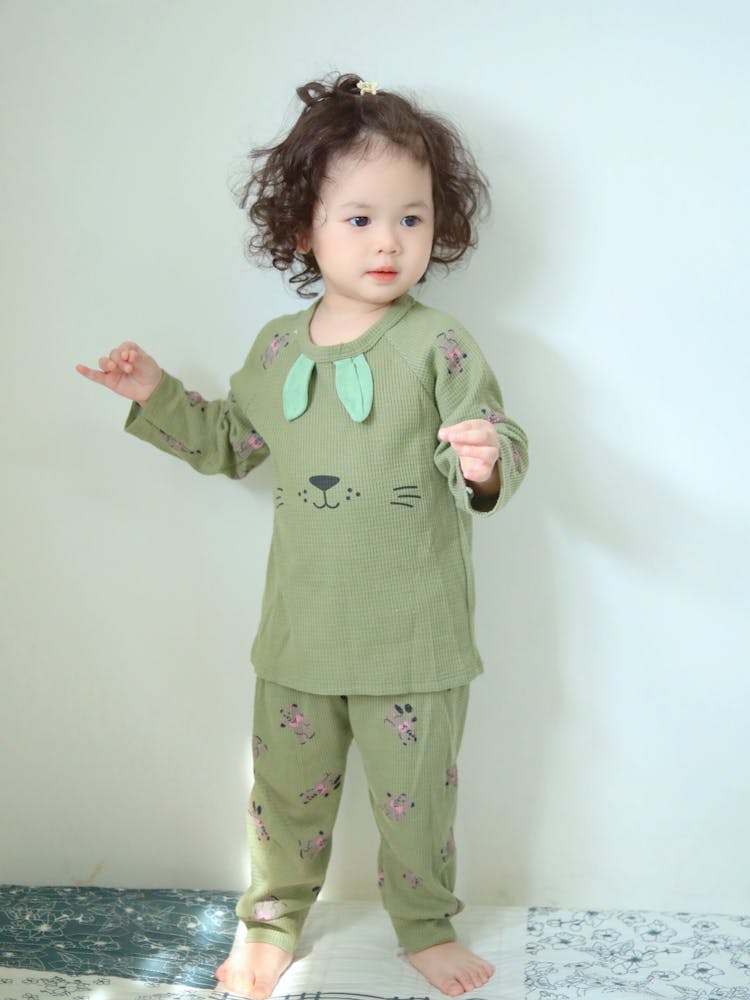 A Little Girl In Pajamas 