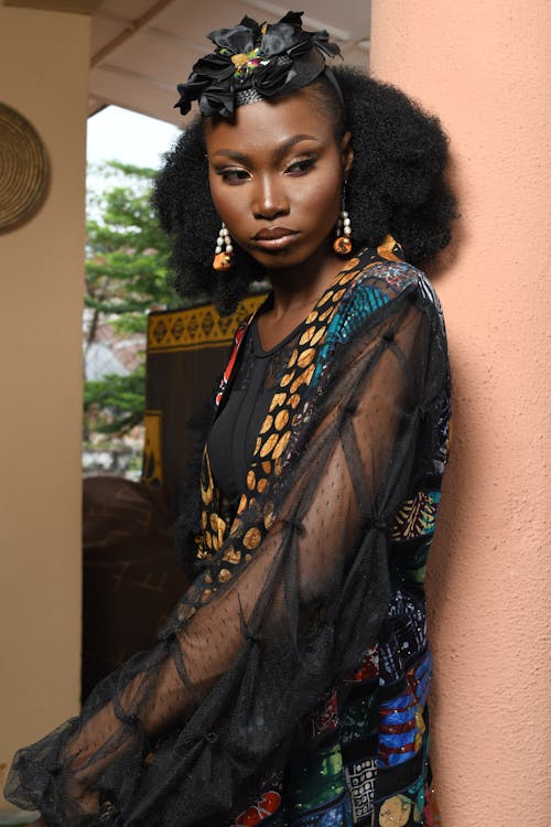 Free Young Woman Wearing a Dress and a Headdress  Stock Photo