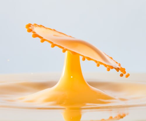 Free Close-up of a Splashing Orange Juice Stock Photo