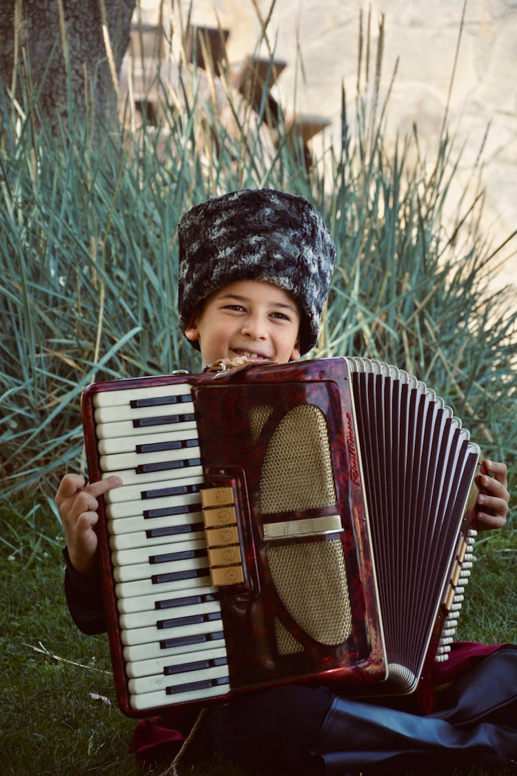 Boy Playing The Accordion 