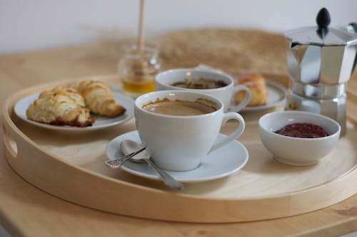 Free Breakfast and Coffees on a Tray Stock Photo