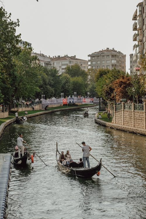 People on Boats on River in Turkish City