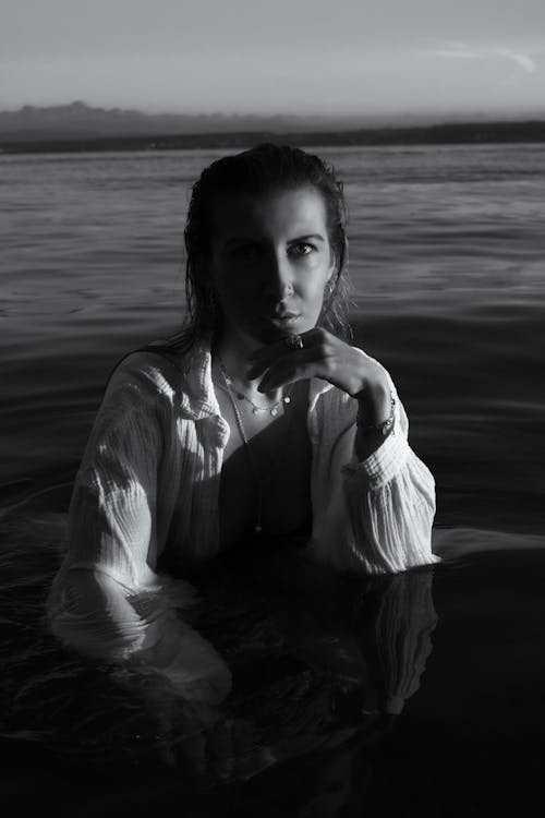 Portrait of a Woman Sitting in the Water