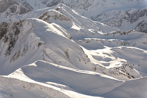 Mountain Range Covered in Snow