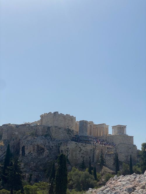 Free The iconic ancient Acropolis in Athens captured under a clear summer sky. Stock Photo