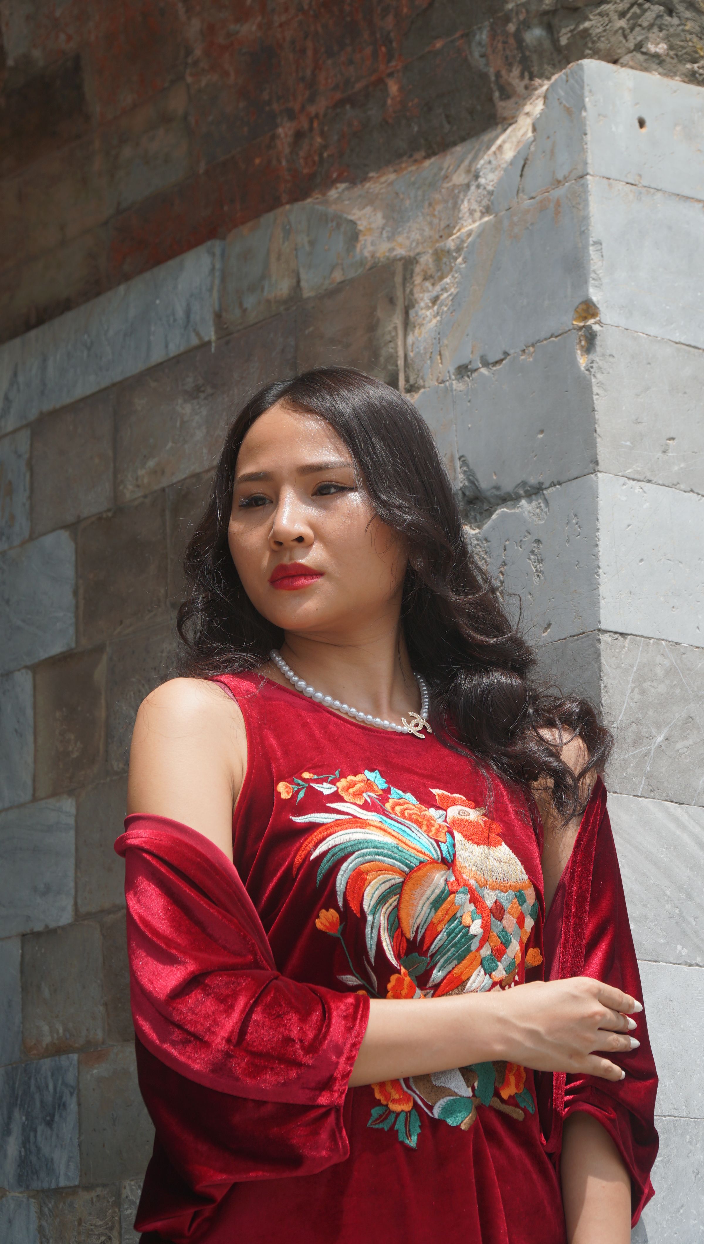 Young Woman in a Red Dress Posing Outside · Free Stock Photo