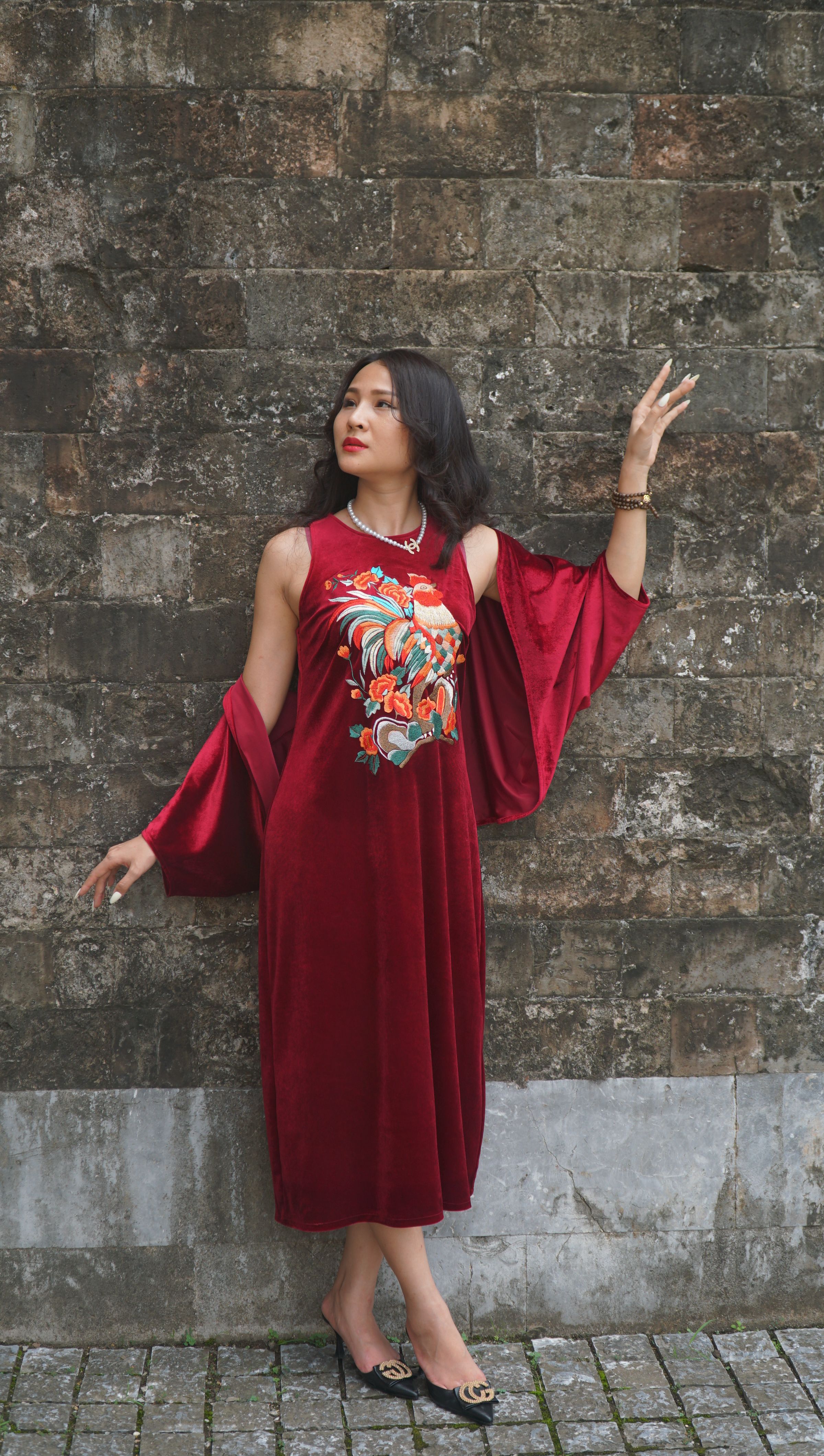 Young Woman in a Red Dress Posing Outside · Free Stock Photo