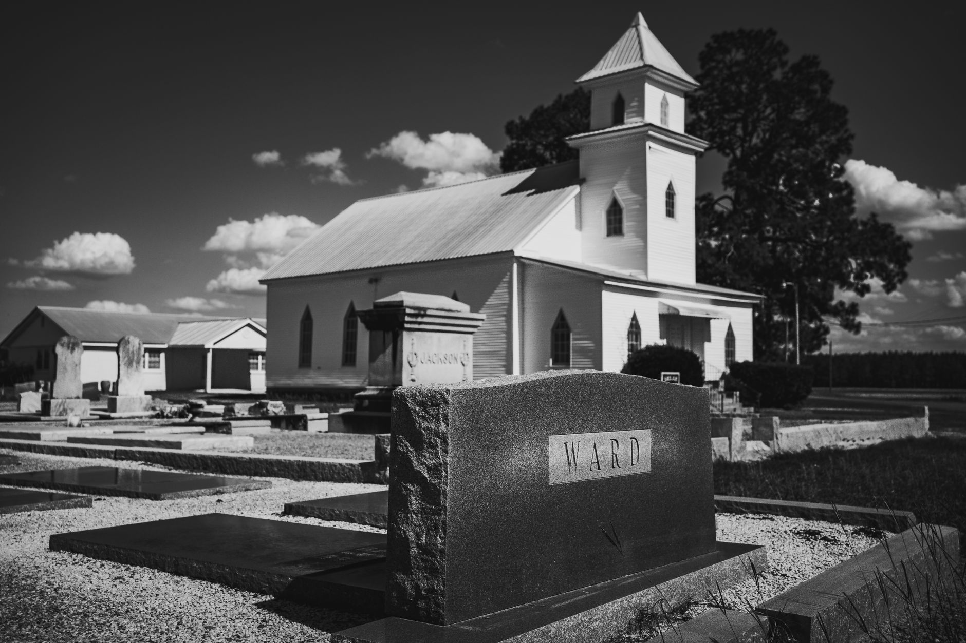 Black and white photo of Shiloh Methodist Church and cemetery in Georgia.