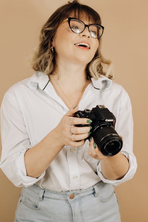 Smiling Woman with Camera