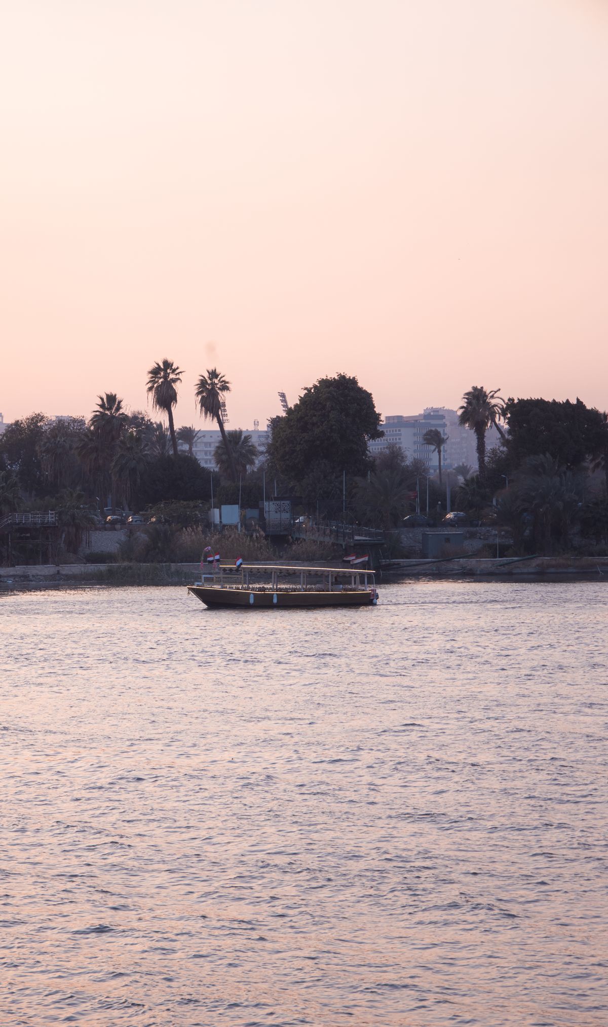 Scenic Cairo Cityscape Along the Nile River · Free Stock Photo