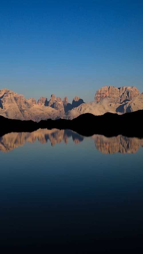 Dolomites Mountains Reflecting in the Black Waters of Lago Nero