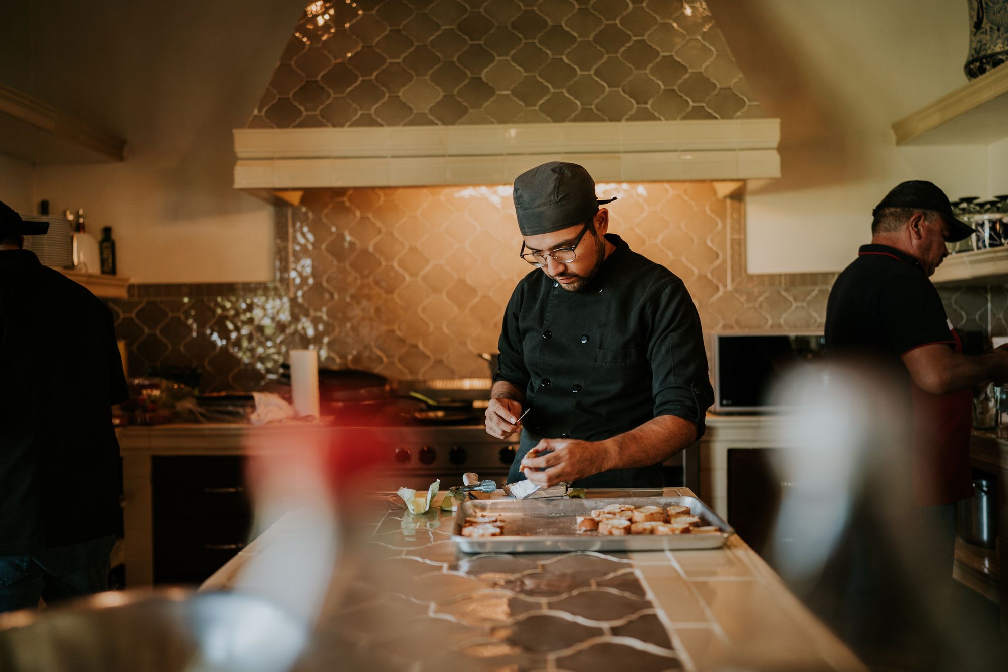 Chef preparing a dish — illustrative hospitality photograph