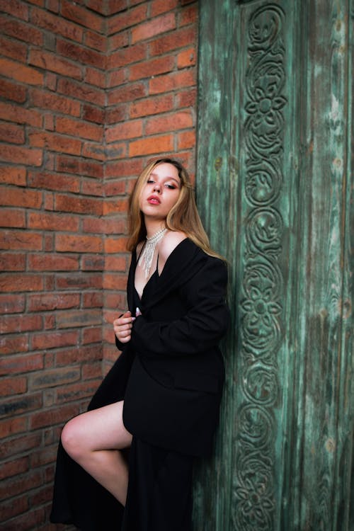 Blonde Woman Posing in Black Clothes